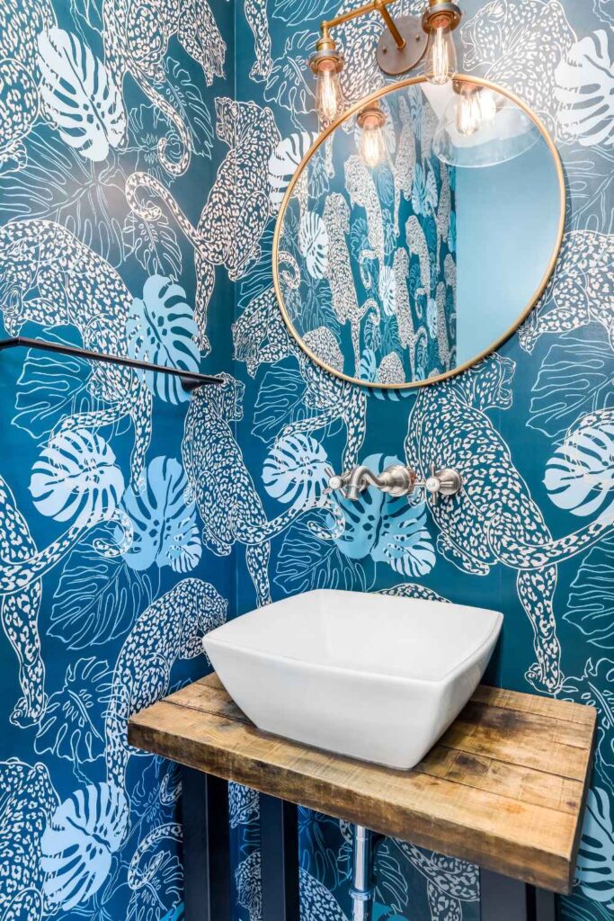 full-service-interior-design-maize-ks-wallpaper-tips-powder-room-with-bold-blue-wallpaper-patterned-jaguars-sophisticated-space-planning