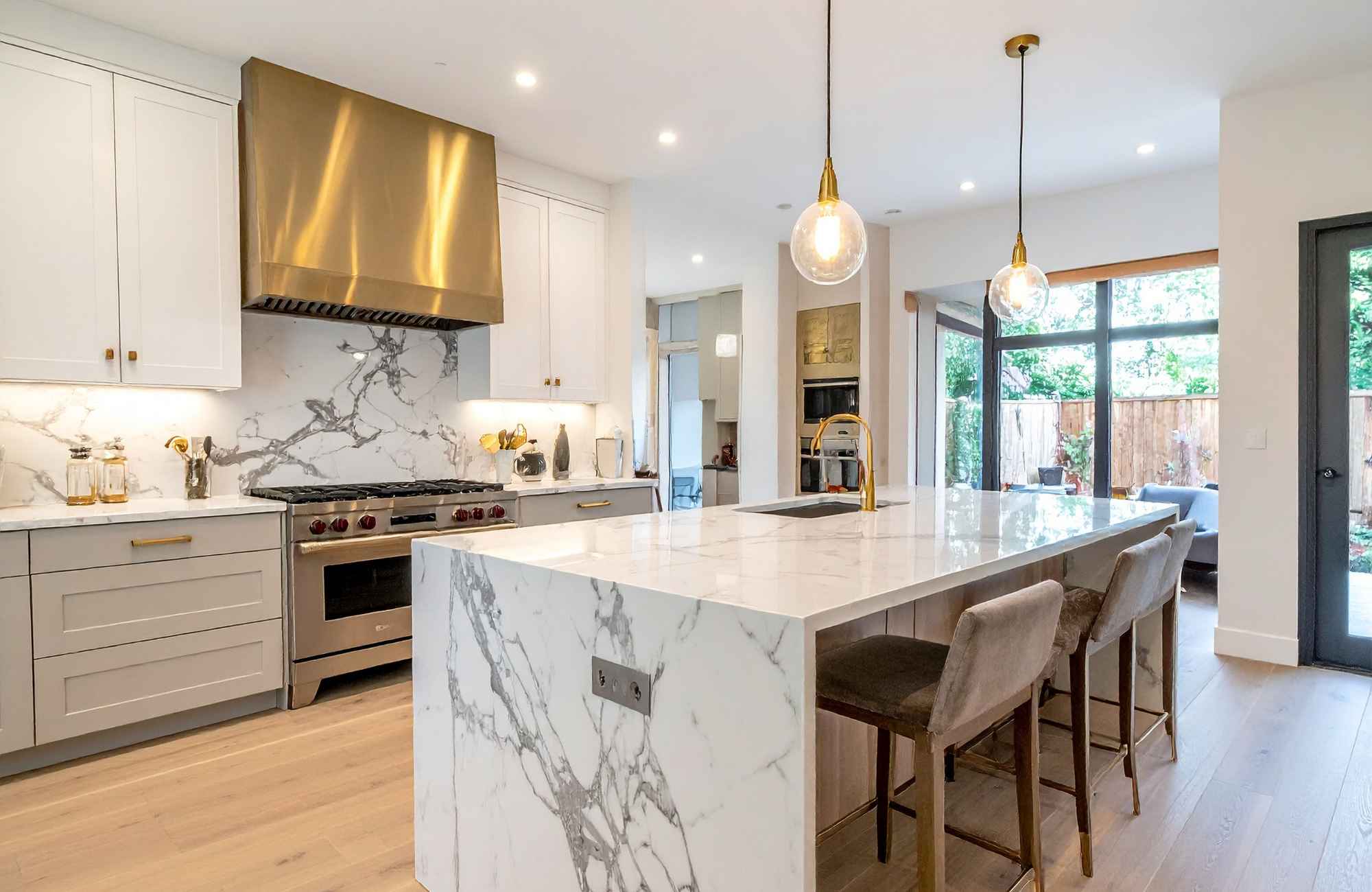 full-service-interior-design-newton-ks-designing-flexible-spaces-luxury-kitchen-waterfall-island-aligned-design-consultation