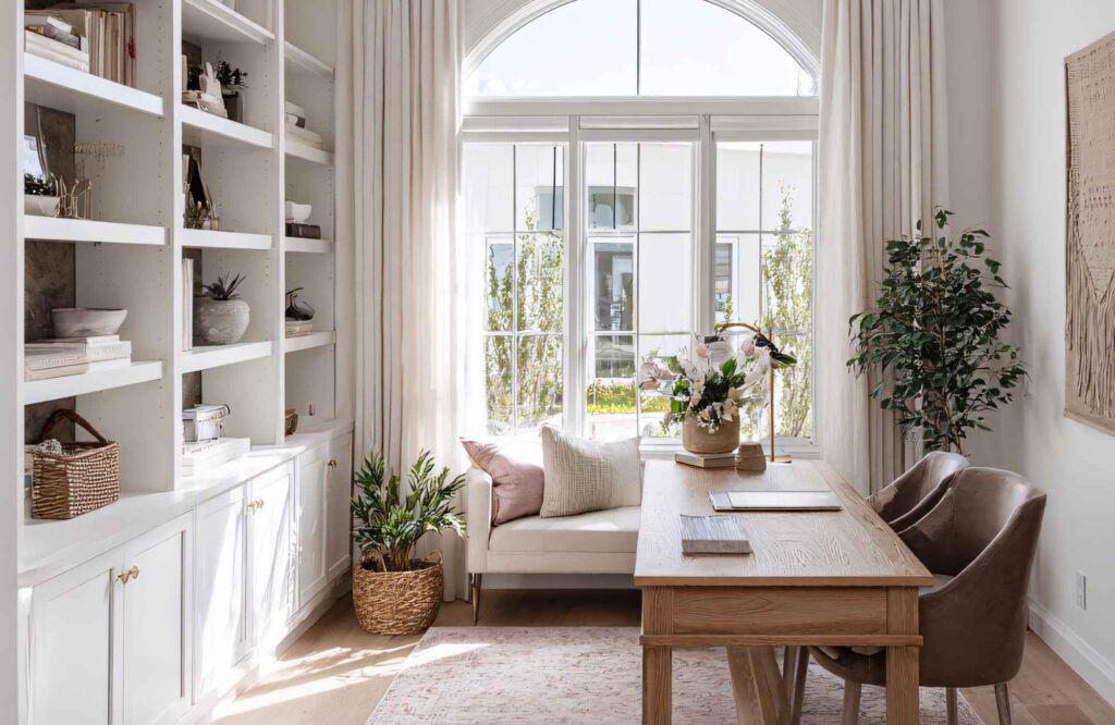 rooted-interior-design-eastborough-ks-designing-flexible-spaces-home-office-desk-two-chairs-built-in-cabinetry-arched-window-sophsiticated-virtual-interior-design