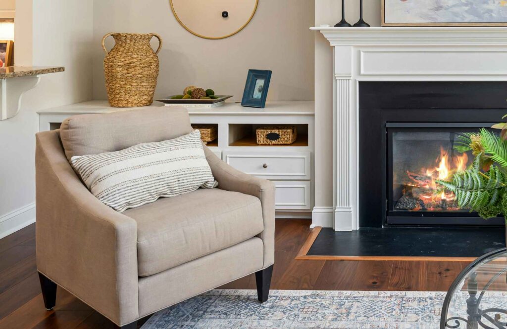 full-service-interior-design-clearwater-ks-choosing-durable-chairs-living-room-with-fireplace-beige-upholstered-chair-built-in-cabinets-design-consultation