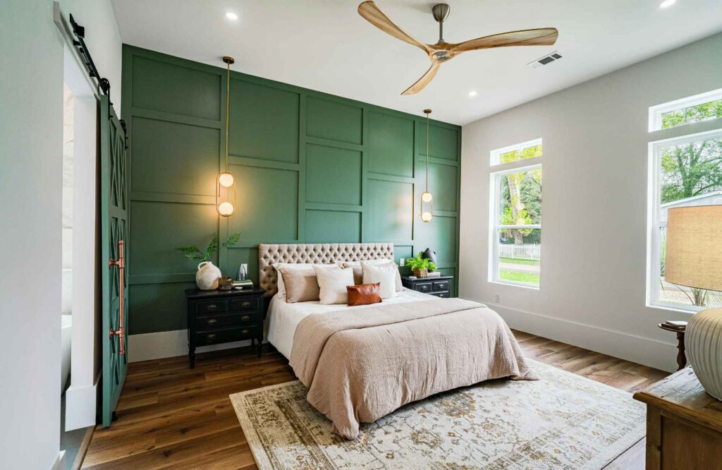 rooted-interior-design-maize-ks-custom-home-design-bedroom-with-green-focal-wall-with-millwork-aligned-sophisticated