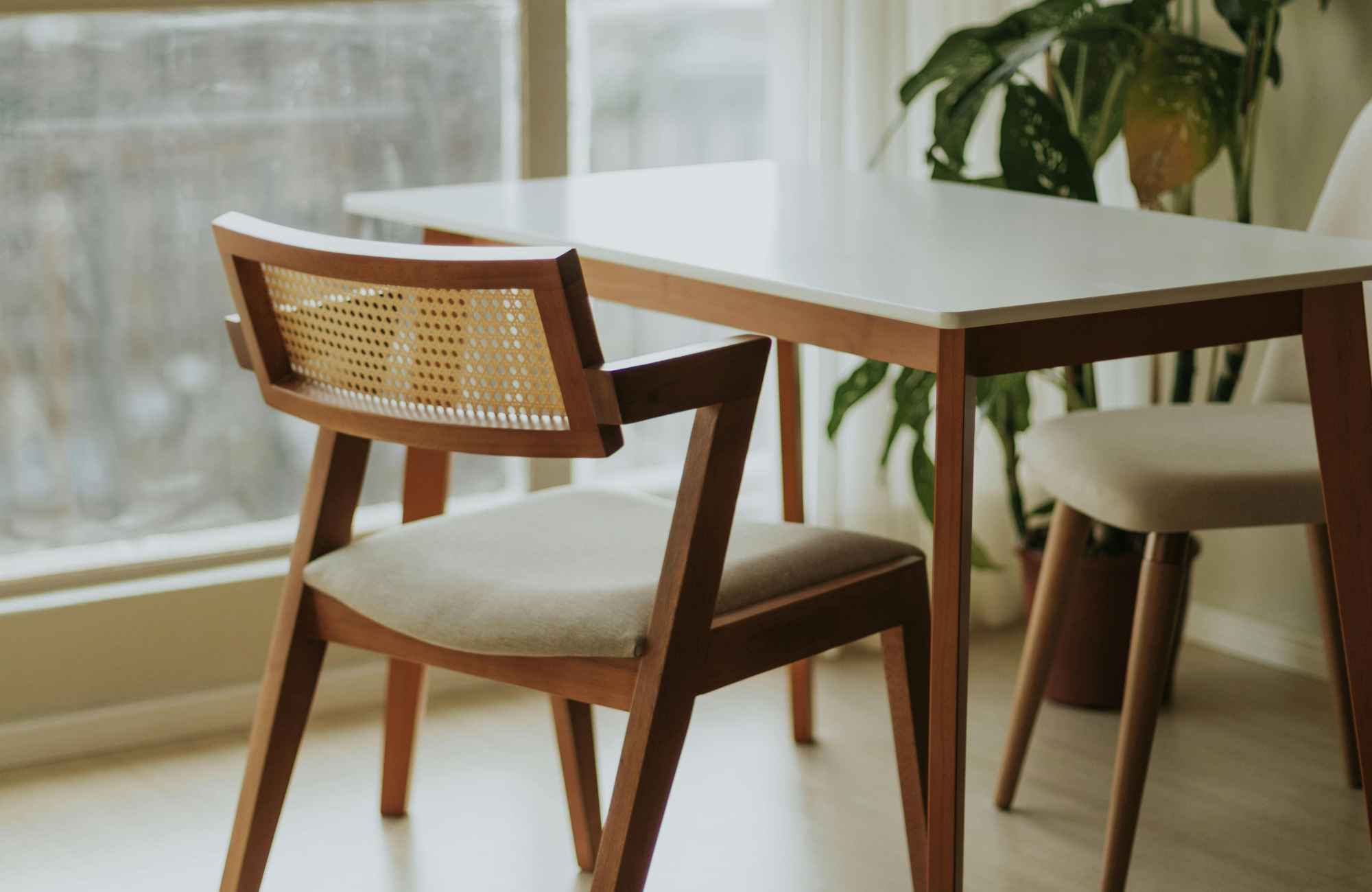 rooted-interior-design-wichita-ks-choosing-durable-chairs-wooden-dining-chair-with-caning-unique-angles-thoughtful-home-furnishings