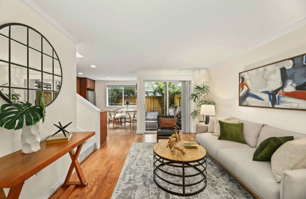 full-service-interior-design-wichita-ks-renovate-or-build-new-living-room-comfortable-furnishings-desk-round-mirror-abstract-art-aligned-design-intensive